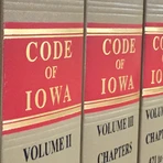 Code of Iowa Books lined up on shelf